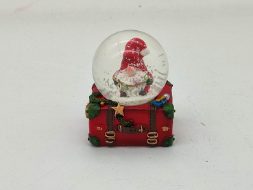 Snow globe gnome on suitcase with chain